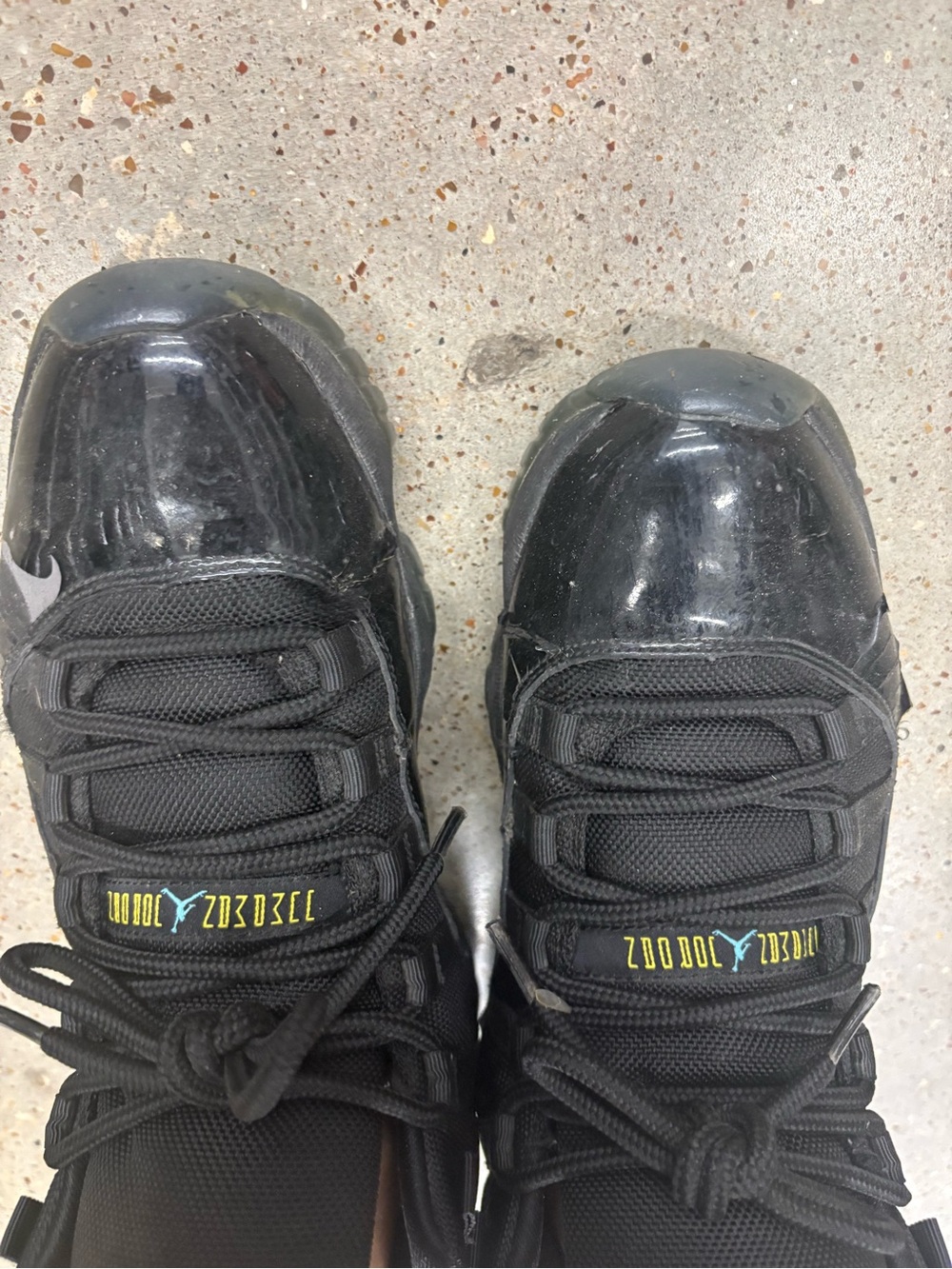 Jordan Black Sneakers with Small Yellow and Blue Accents